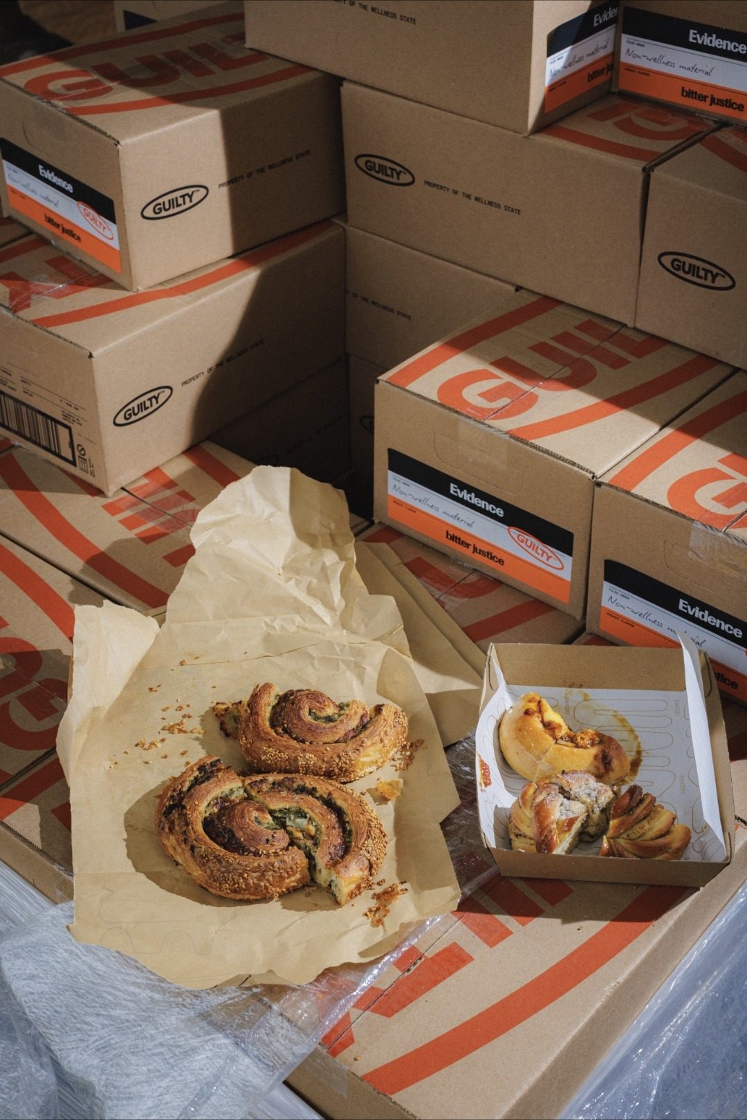 Guilty Evidence boxes with pastries