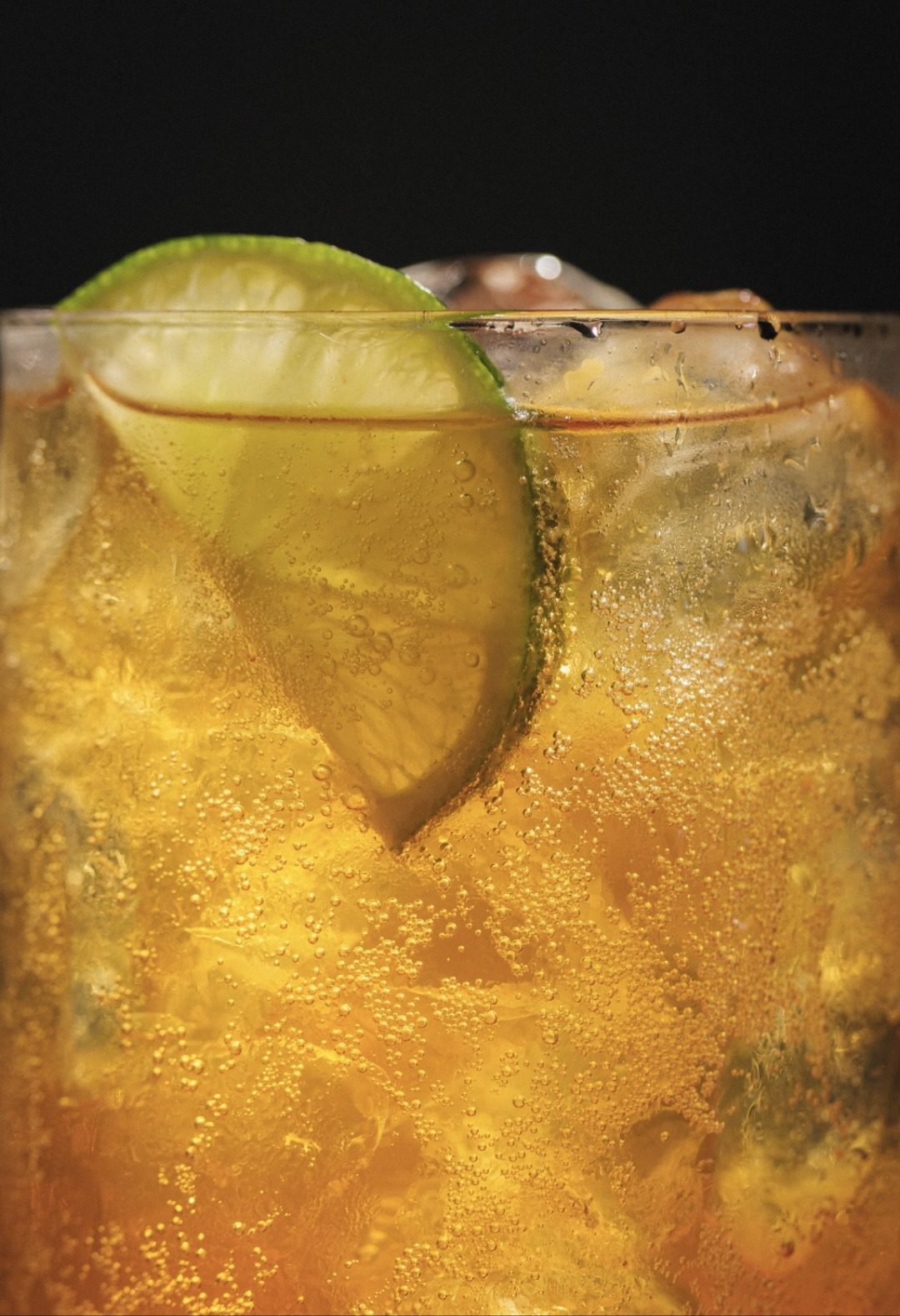 Guilty poured over ice with a slice of lime